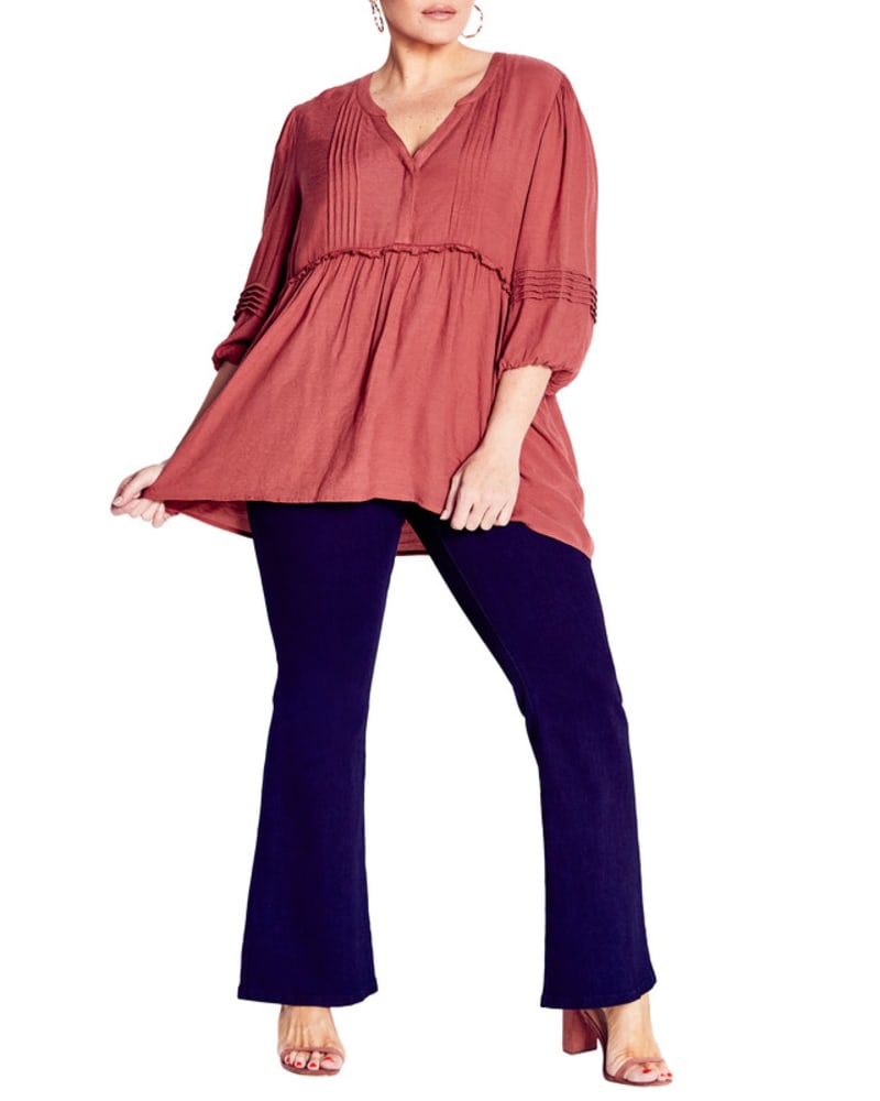 Front of a model wearing a size 14 TOP ASHLEY PINTUCK in Terracotta by avenue. | dia_product_style_image_id:280379